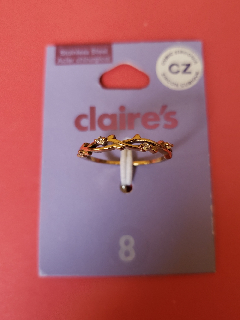Claire's Gold Twisted Floral Ring with CZ Accents